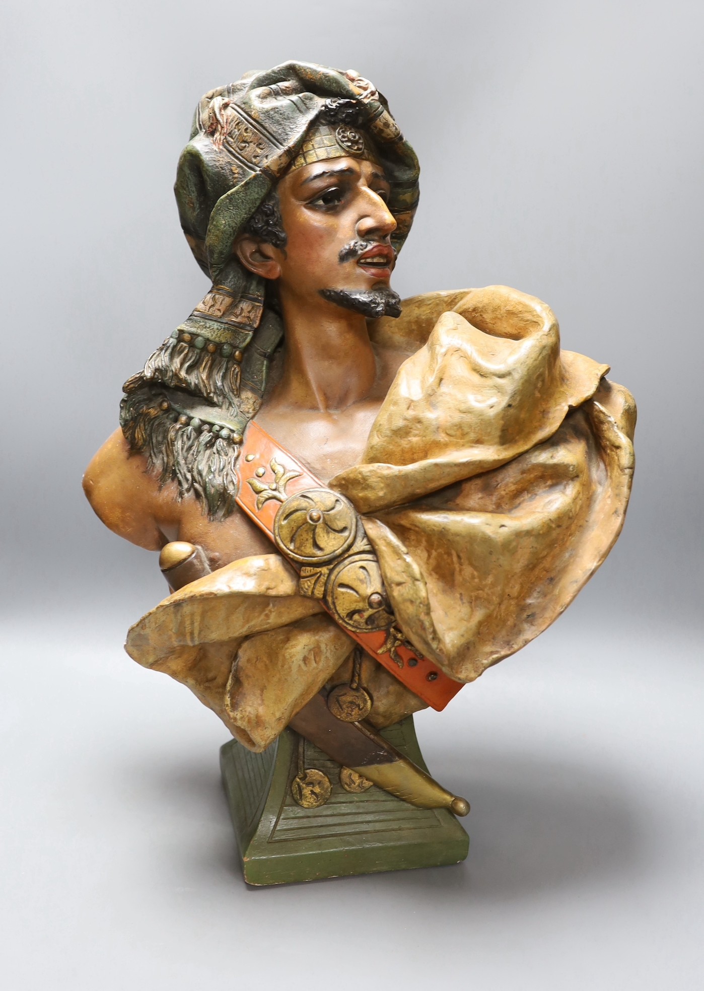 An Austrian terracotta bust of an Arabian warrior, stamped Geschutzt, 50cm